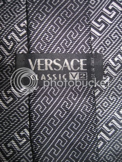 spot a fake versace tie|Versace tie logo.